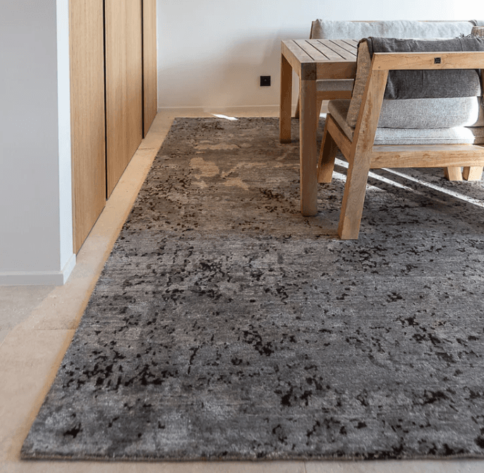 Rug and dining furniture in an interior